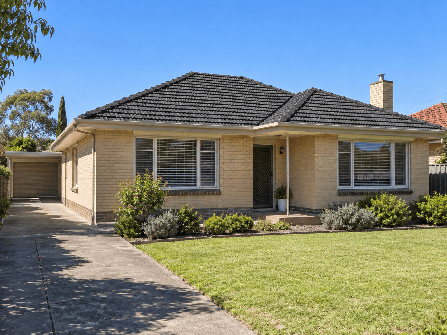 Classic Adelaide brick home with Monument roof colour